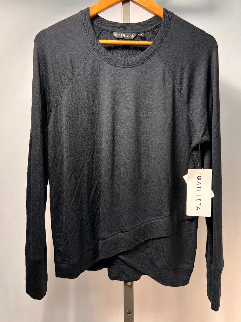 ATHLETA Soft Black Crossover Tulip Hem Sweatshirt Pullover Top M NWT